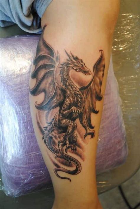 tatuaje dragon pierna|Tatuaje de dragón: significado e imágenes para。